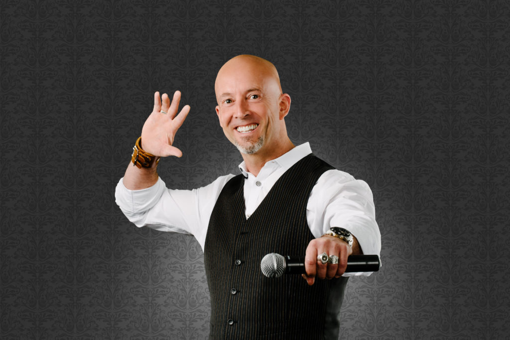 Celebrity Hypnotist Erick Känd on Gray Background